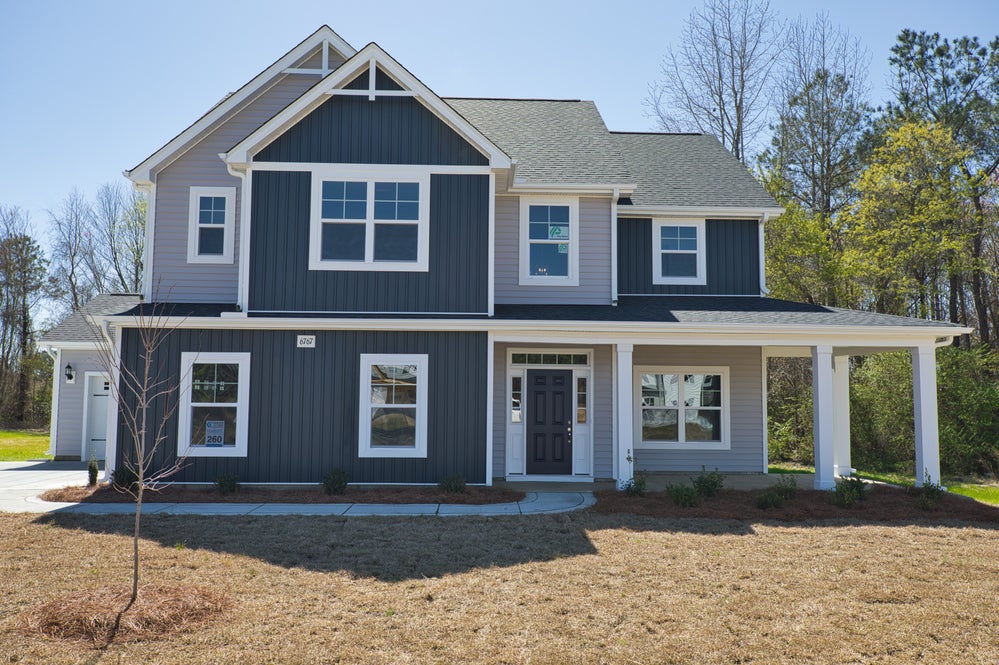 Elevation F with 3-Car Sideload Garage Option. New Home in Clayton, NC